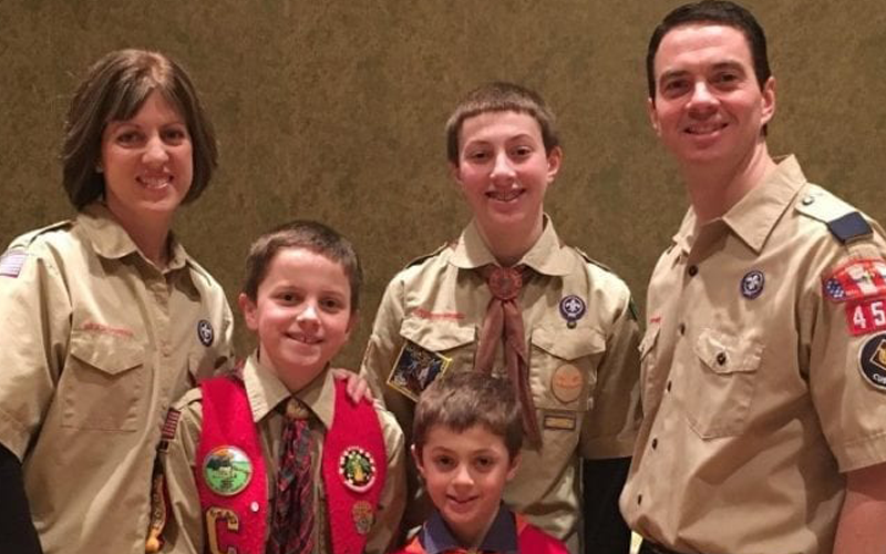 They all are involved in the local cub scout pack at their boys’ elementary school