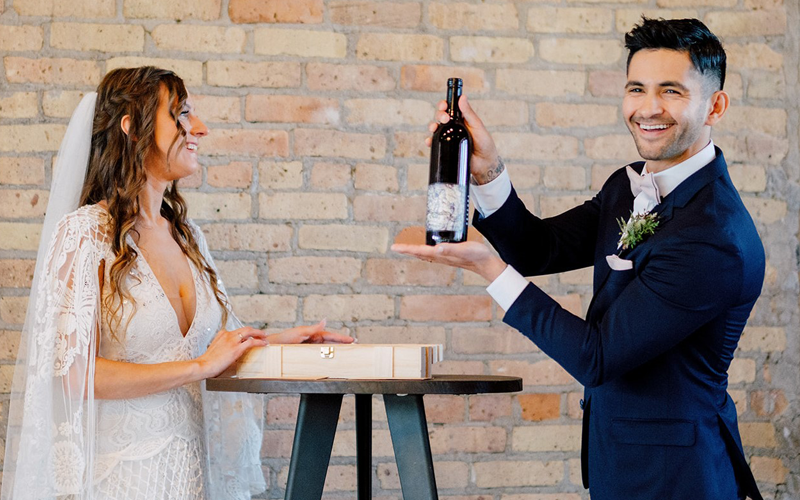 Wedding - Man Holding Wine - Image